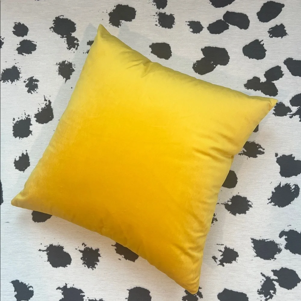 Yellow velvet throw pillow